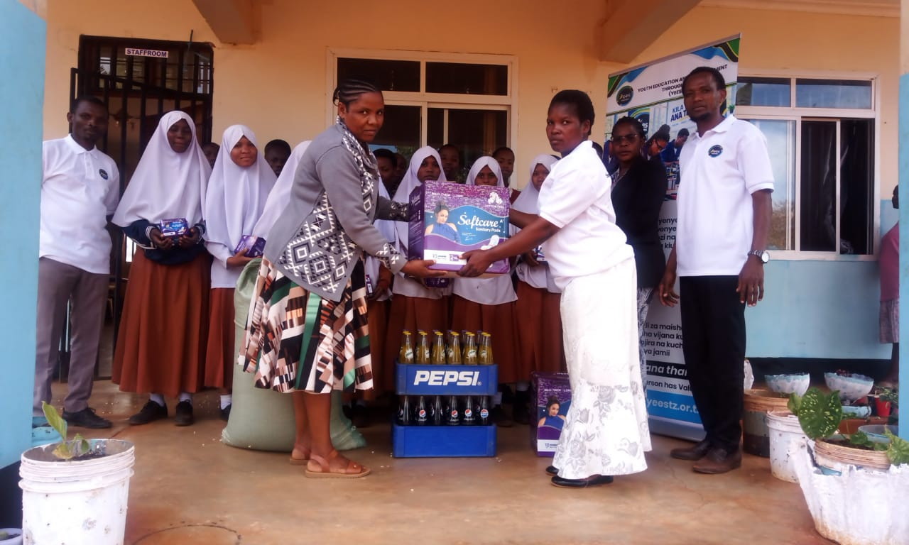 Presentation of packaged activity materials during a YEES TZ activity.